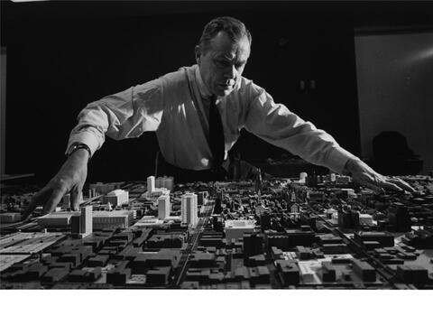 Mayor Richard Lee surveying model of New Haven in connection with redevelopment plans. 1963-65. Richard Charles Lee Papers.